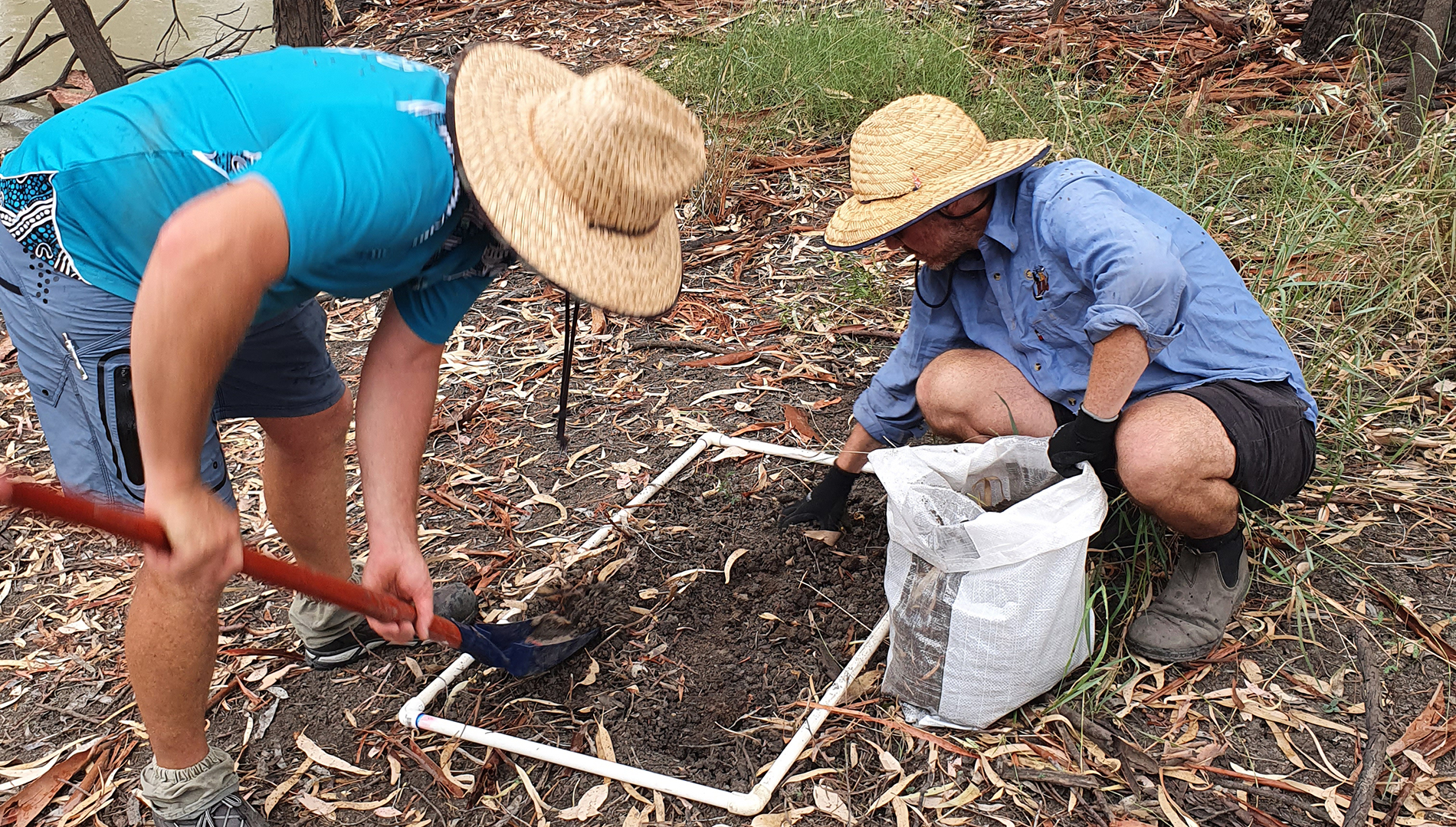 The department's Water Group and University of Canberra scientists collecting sediments from the river bank to measure ecosystem responses to high flows.