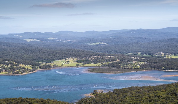 Aerial view over Oyster farms, Merimbula Lake NSW.