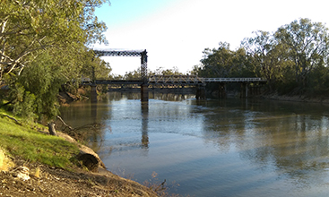 Murray River at Toolebuc with a metal bridge over the water